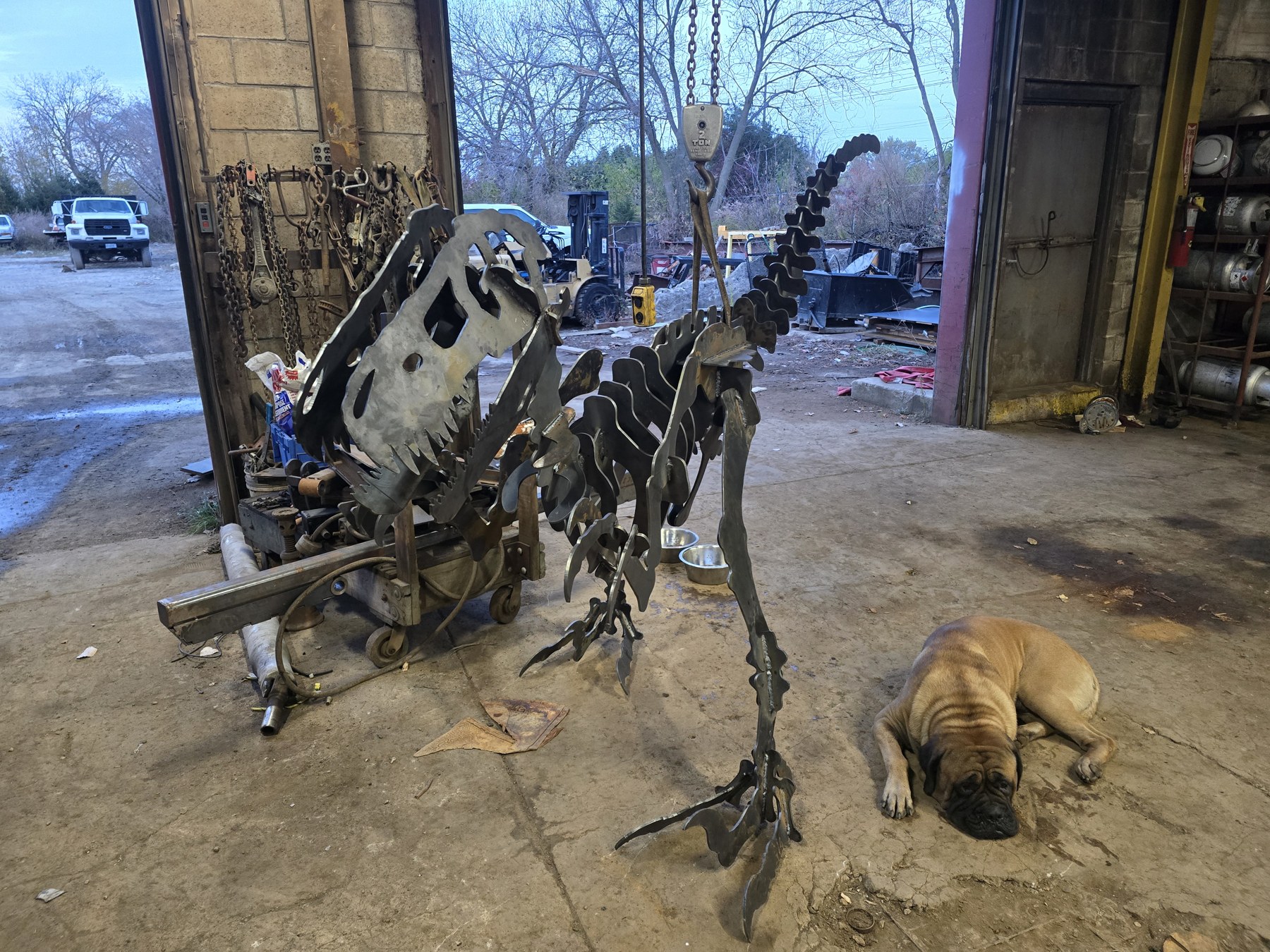 Velociraptor at the workshop door